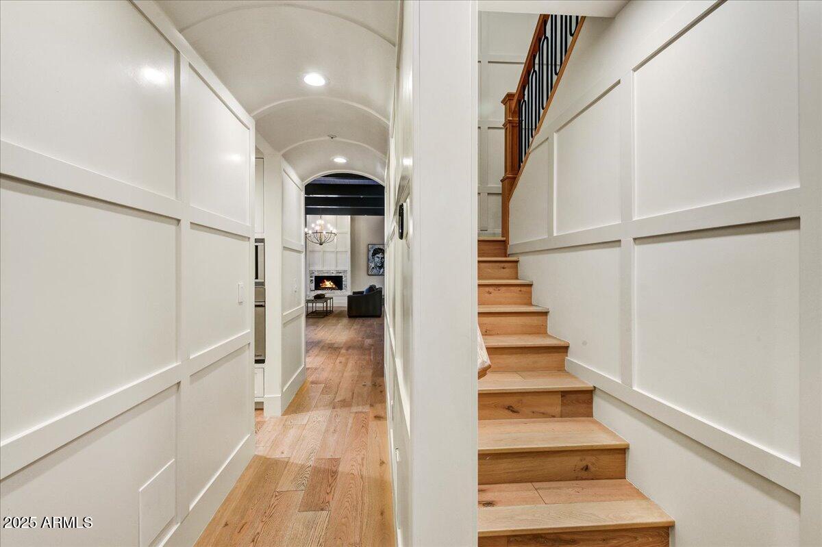 25255 North 90th Way Scottsdale, AZ 85255 - Photo 18 of 41 a view of entryway and hall with wooden floor
