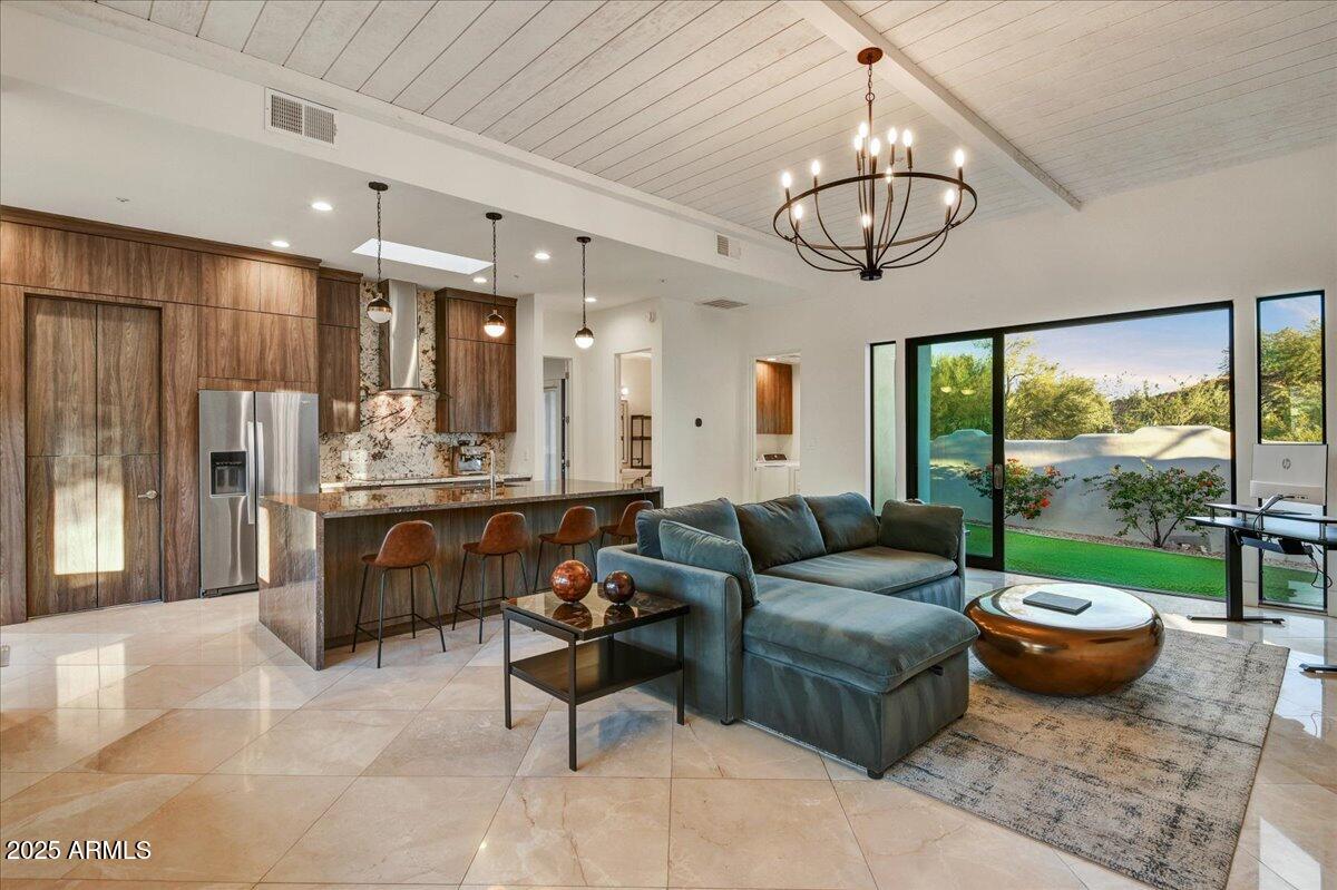 25255 North 90th Way Scottsdale, AZ 85255 - Photo 31 of 41 a living room with lots of furniture and a large window