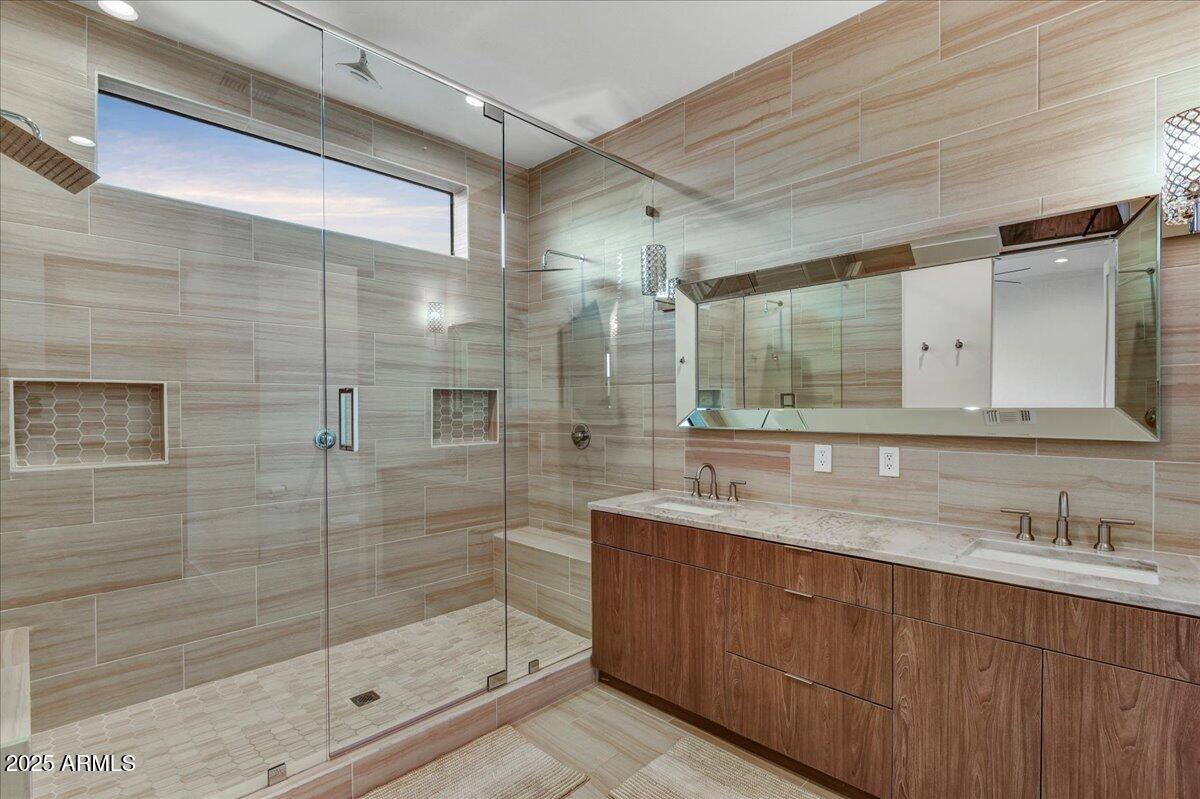 25255 North 90th Way Scottsdale, AZ 85255 - Photo 33 of 41 a bathroom with a shower sink and mirror