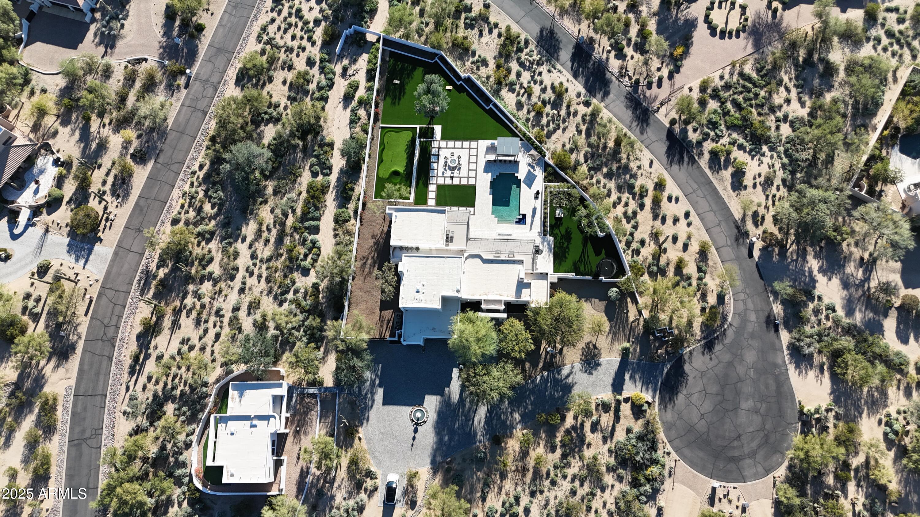 25255 North 90th Way Scottsdale, AZ 85255 - Photo 36 of 41 an aerial view of a house with a yard