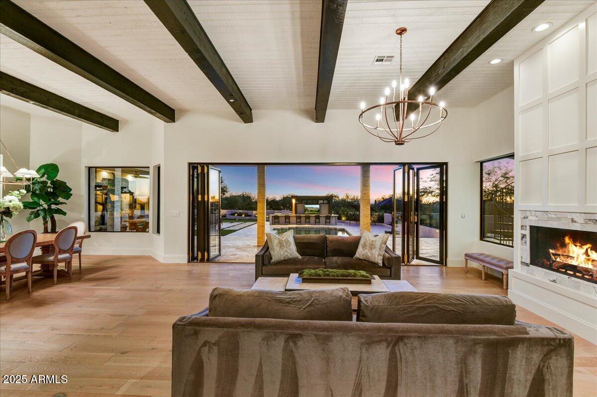 25255 North 90th Way Scottsdale, AZ 85255 - Photo 8 of 41 a living room with fireplace furniture and a flat screen tv