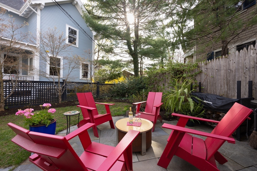 4 Vogel Terrace Brookline, MA 02445 - Photo 6 of 6 a view of a chairs and table in backyard