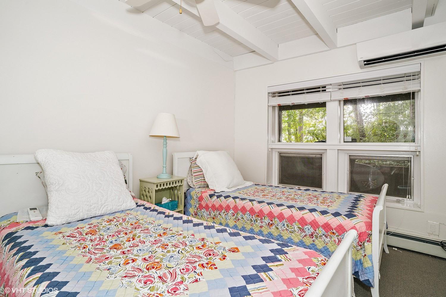 64 Fells Pond Road Mashpee, MA 02649 - Photo 17 of 25 a bedroom with a bed and window