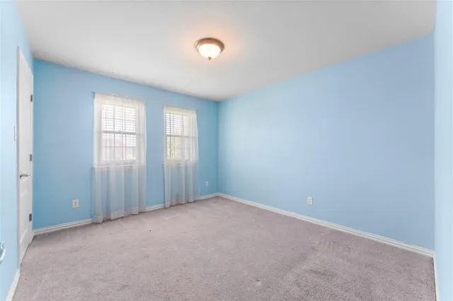 an empty room with an entryway