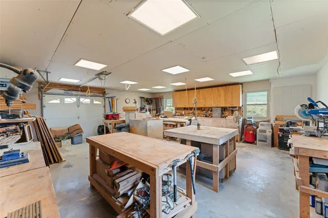 a room with lots of furniture and clutter