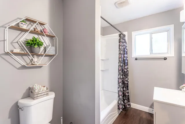 a room with a window and a table