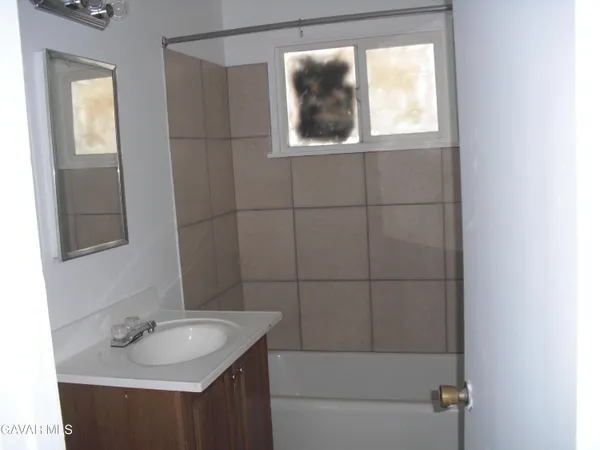 a bathroom with a sink and a toilet