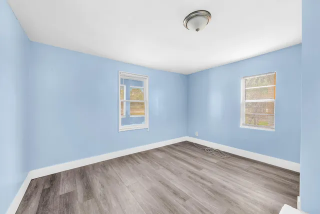 an empty room with windows