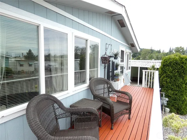 a view of balcony patio and fire pit