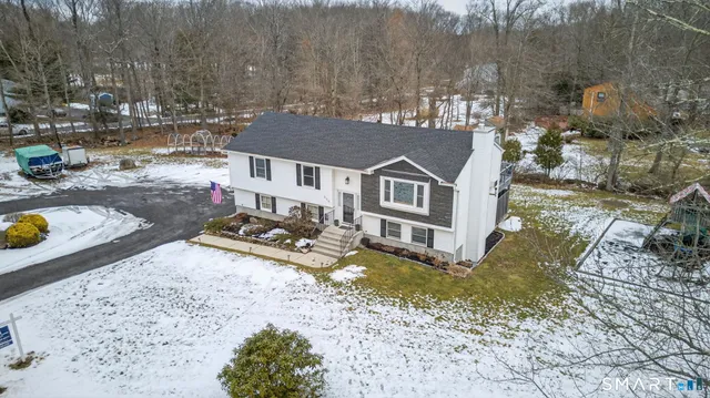a view of a house with swimming pool