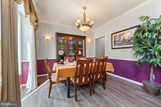 a bedroom with double bed and a window