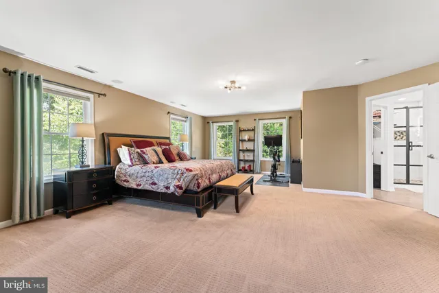 a livingroom with furniture and a flat screen tv