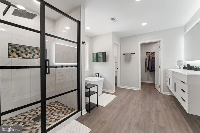 a bedroom with bed and window