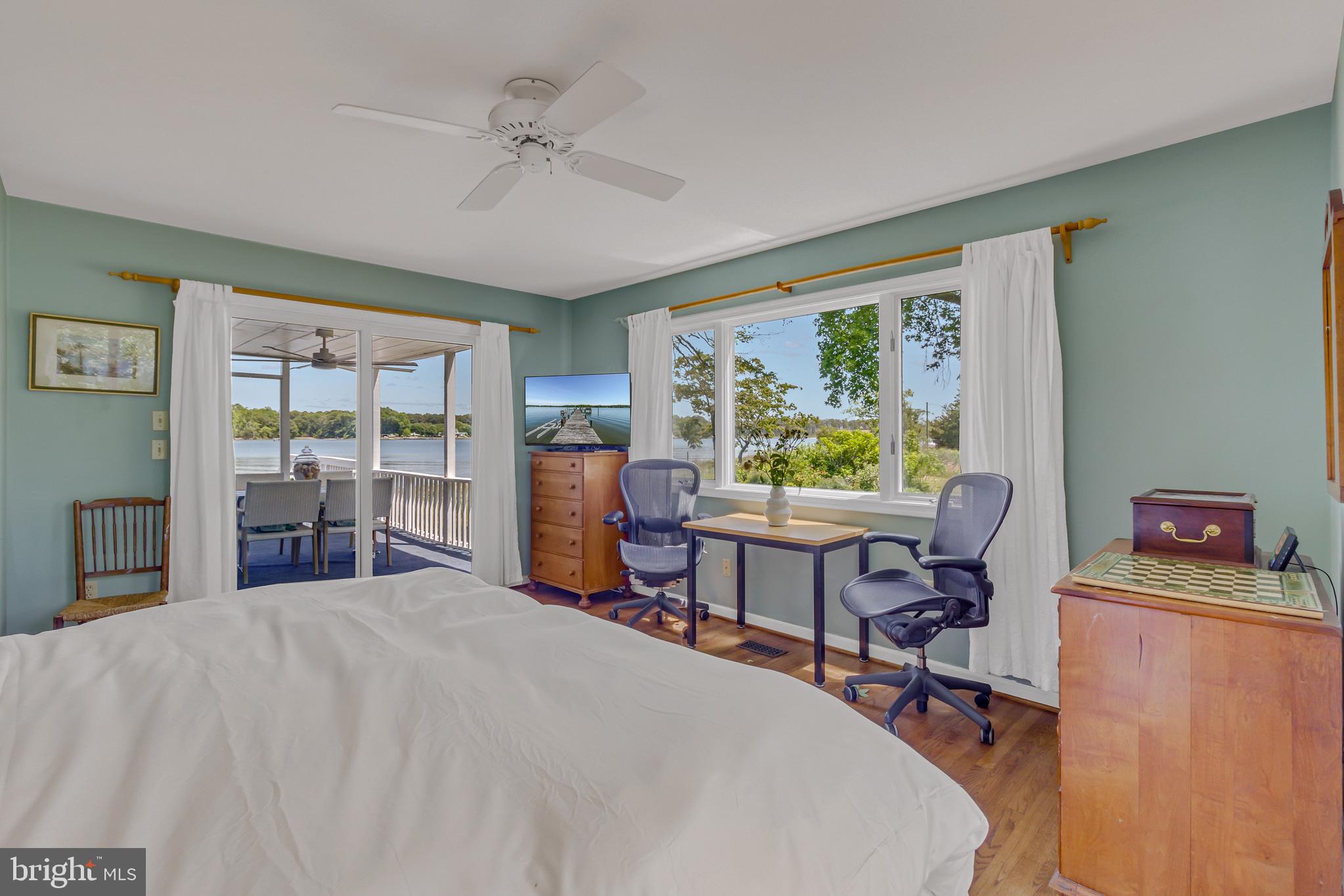 2215 Ditchley Road Kilmarnock, VA 22482 - Photo 43 of 103 Main level Primary bedroom with gorgeous views!