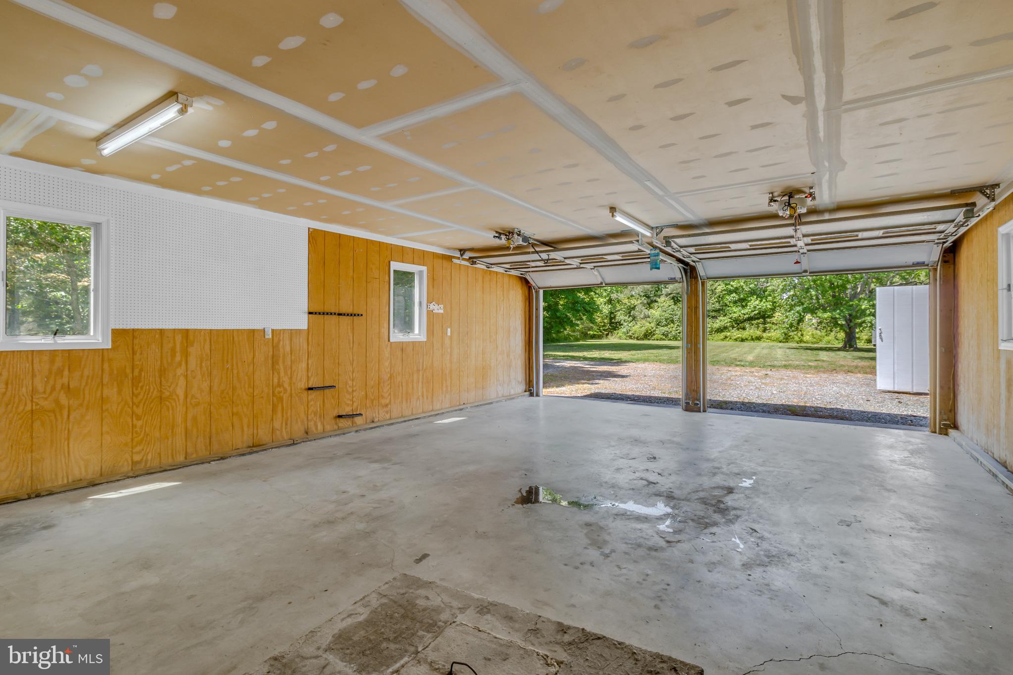 2215 Ditchley Road Kilmarnock, VA 22482 - Photo 87 of 103 Oversized 2 car garage!