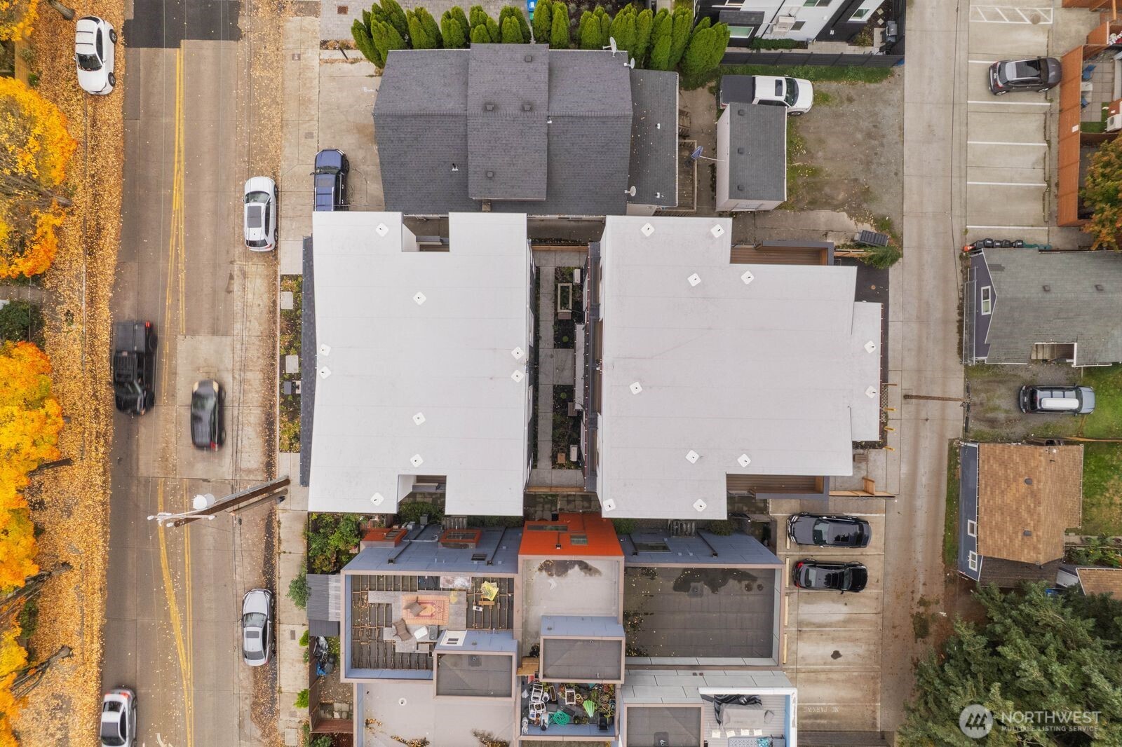 548 South Cloverdale Street, Unit D Seattle, WA 98108 - Photo 37 of 40 an aerial view of residential houses with outdoor space and parking