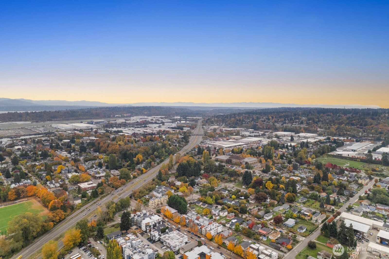 548 South Cloverdale Street, Unit D Seattle, WA 98108 - Photo 39 of 40 an aerial view of residential houses with city view