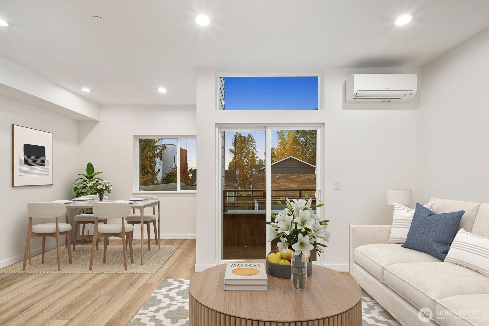 548 South Cloverdale Street, Unit D Seattle, WA 98108 - Photo 8 of 40 a living room with furniture and a potted plant