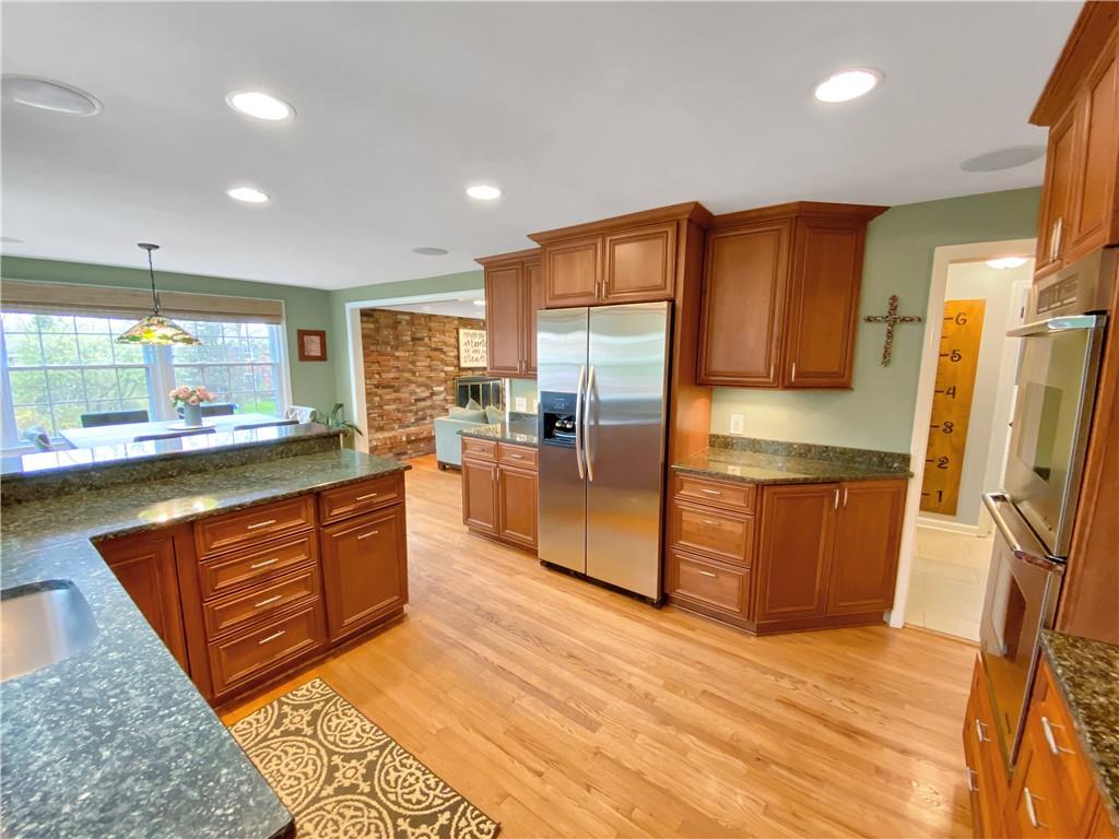 108 Lamar Road Pittsburgh, PA 15241 - Photo 11 of 40 The kitchen opens to the first floor family room.