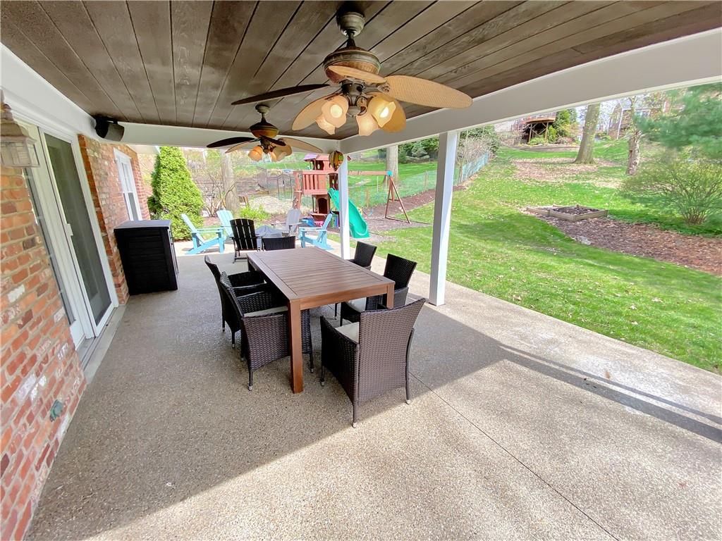 108 Lamar Road Pittsburgh, PA 15241 - Photo 34 of 40 Newer cement rear patio is partially covered. Speaker are connected to the family room and kitchen.