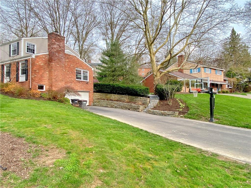 108 Lamar Road Pittsburgh, PA 15241 - Photo 39 of 40 Long, level driveway is accessed from the cul-de-sac side street... great for riding bikes, roller skating, etc.!