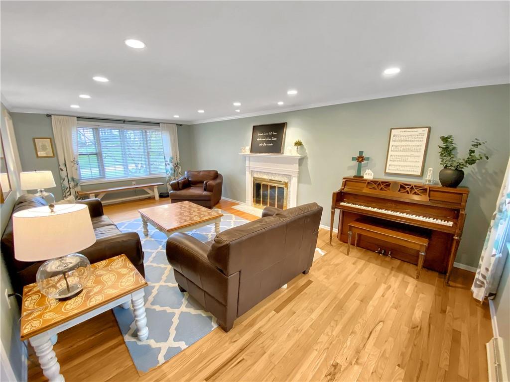 108 Lamar Road Pittsburgh, PA 15241 - Photo 5 of 40 The living room also features a bow window and gas fireplace.