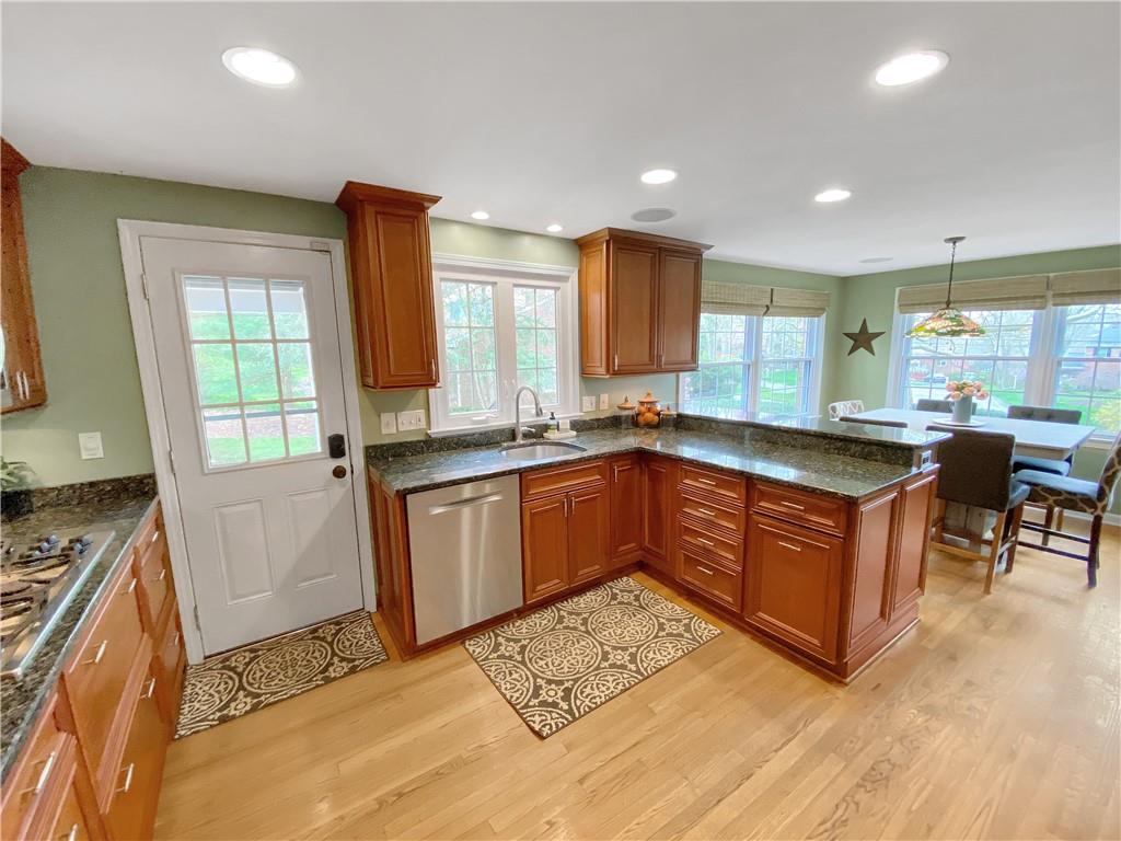 108 Lamar Road Pittsburgh, PA 15241 - Photo 10 of 40 Granite countertops and recessed lighting complement the kitchen.
