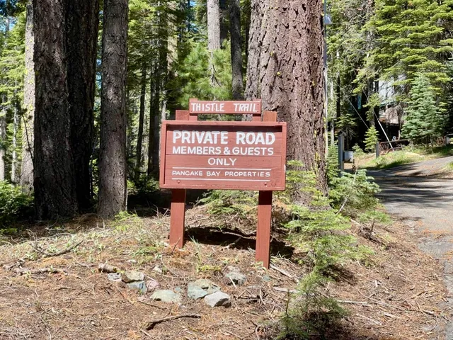 a view of staircase with wooden floor