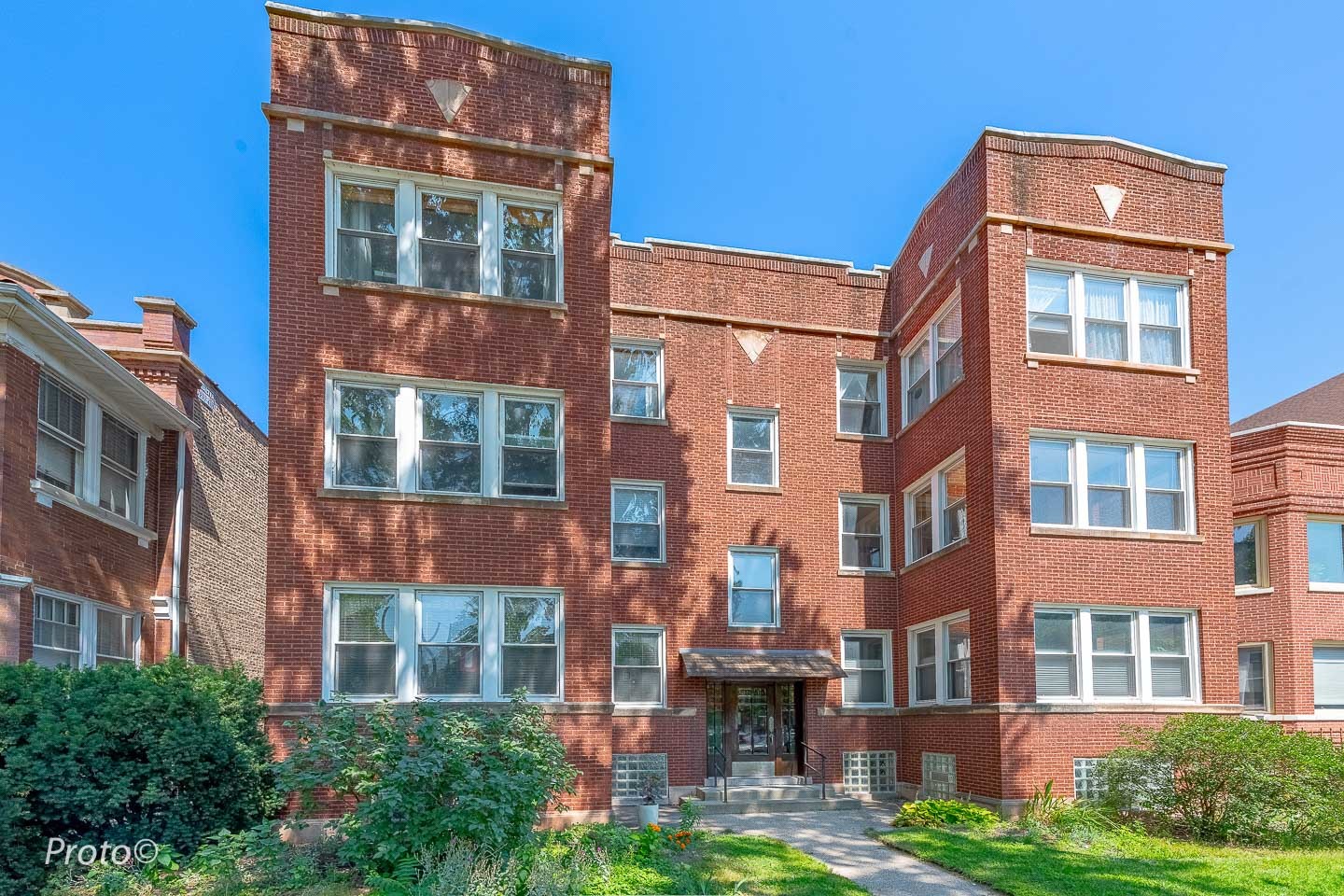 1410 West Bryn Mawr Avenue, Unit 2E Chicago, IL 60660 - Photo 1 of 27 a front view of a multi story building