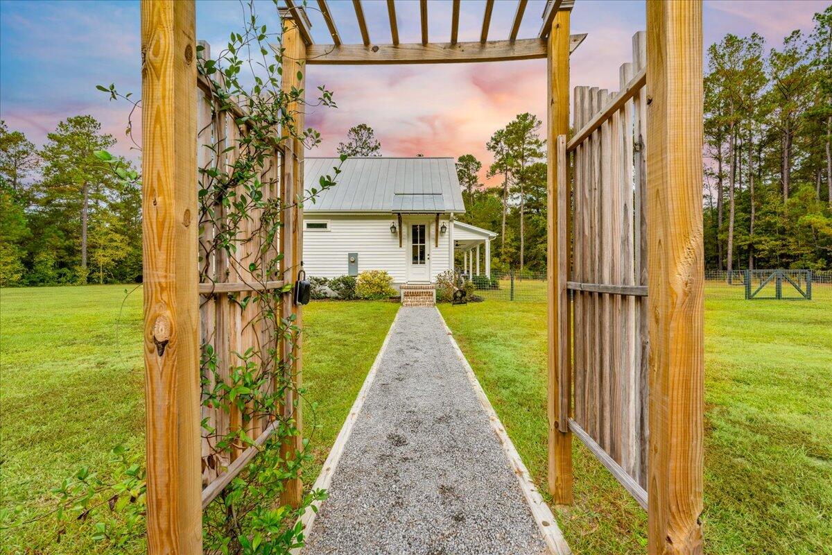 2494 Harristown Road St. Stephen, SC 29479 - Photo 48 of 50 Path from drivewaay to Side door