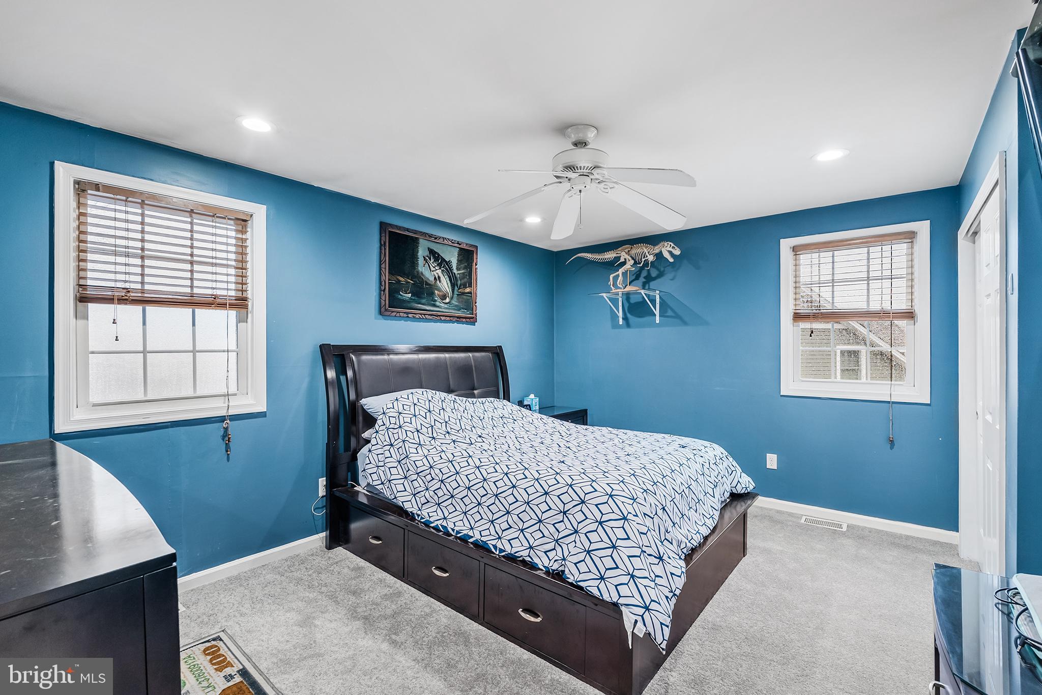 541 Stanford Road Fairless Hills, PA 19030 - Photo 20 of 30 Vibrant blue bedroom with cozy ambiance.