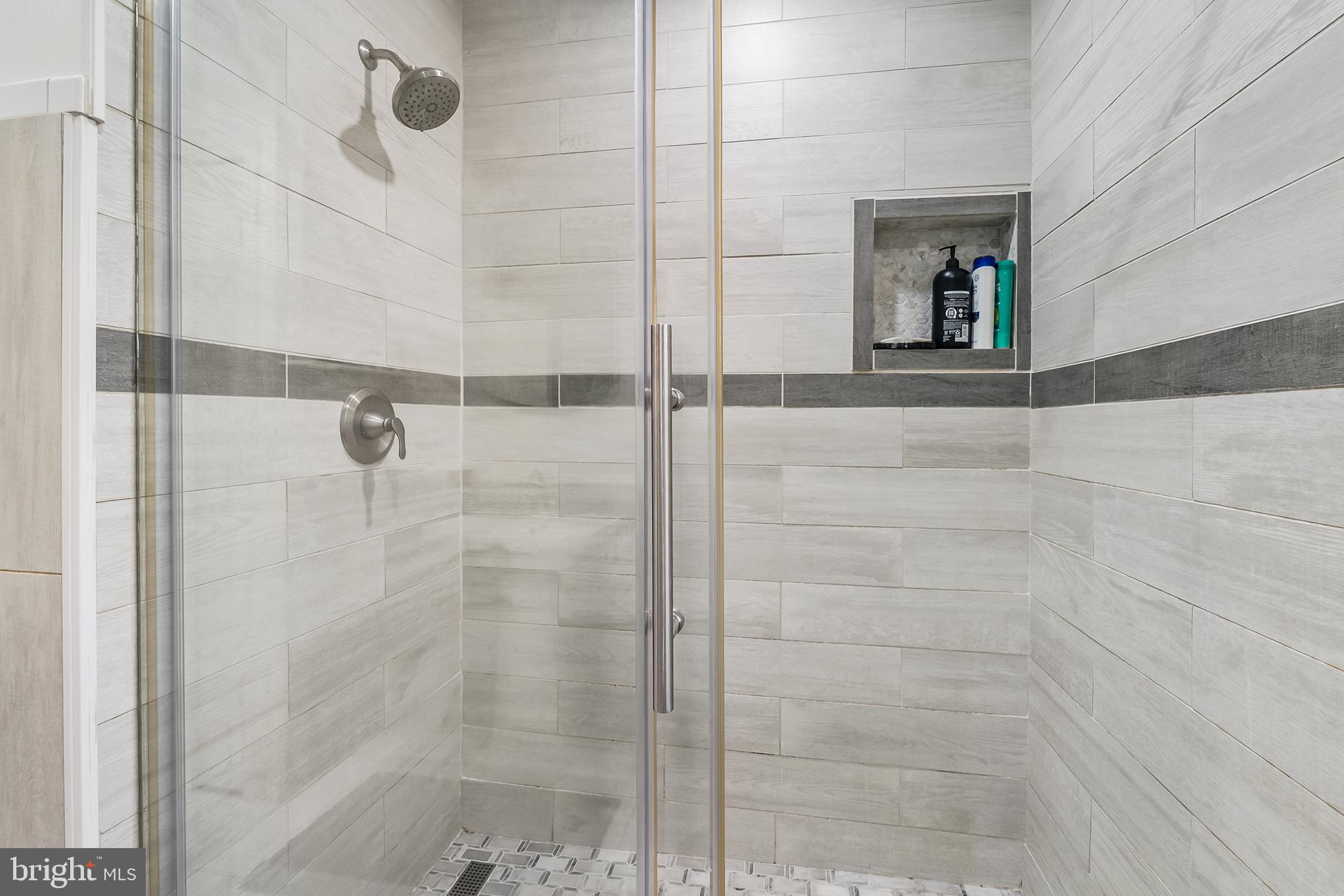 541 Stanford Road Fairless Hills, PA 19030 - Photo 25 of 30 Sleek modern shower with elegant tiles.