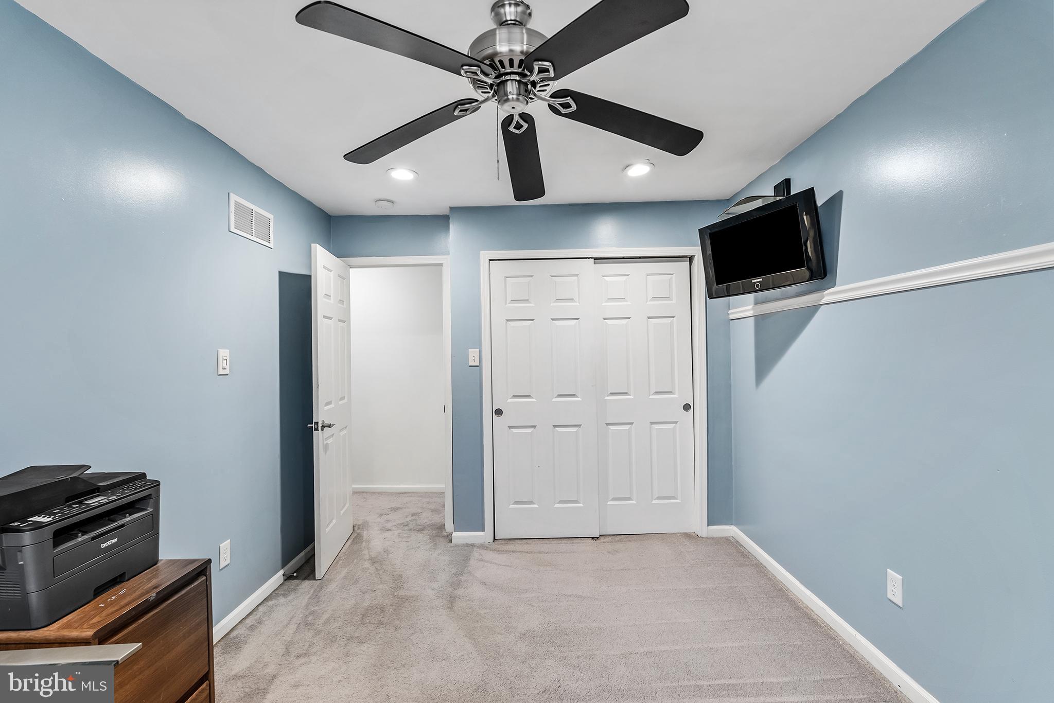 541 Stanford Road Fairless Hills, PA 19030 - Photo 27 of 30 Serene blue-hued room with modern fixtures.