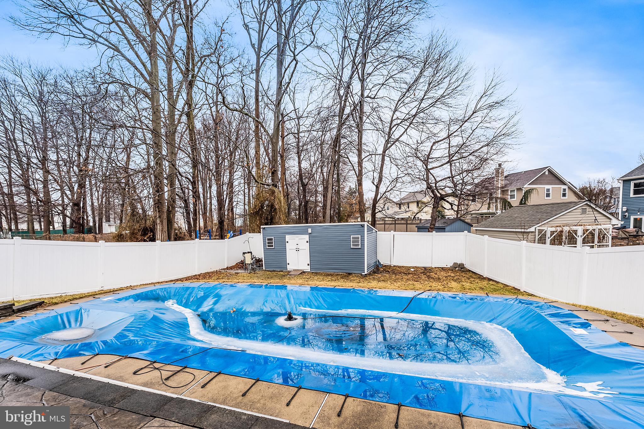 541 Stanford Road Fairless Hills, PA 19030 - Photo 28 of 30 Serene backyard oasis with a covered pool.