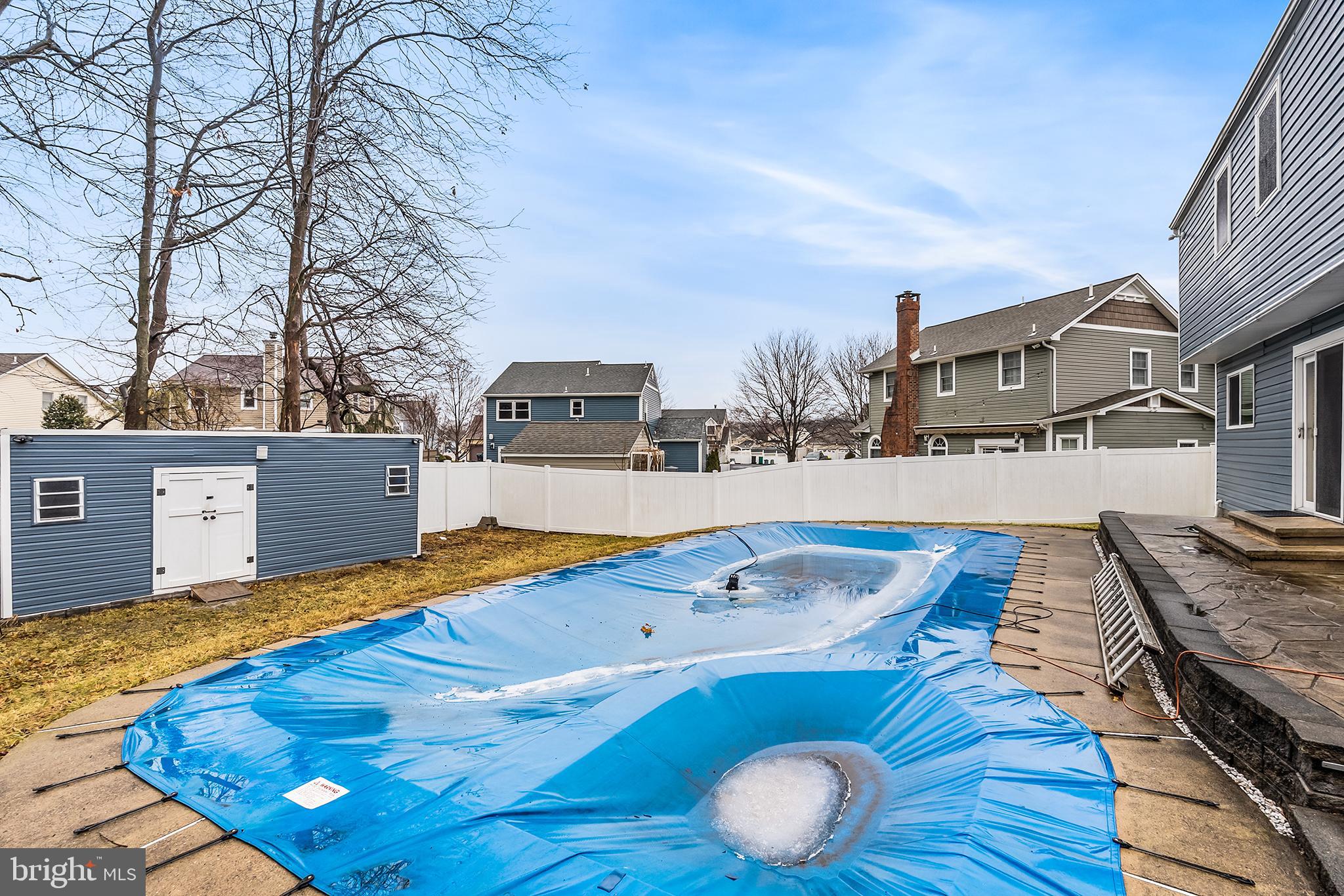 541 Stanford Road Fairless Hills, PA 19030 - Photo 30 of 30 Inviting backyard with a covered pool oasis.