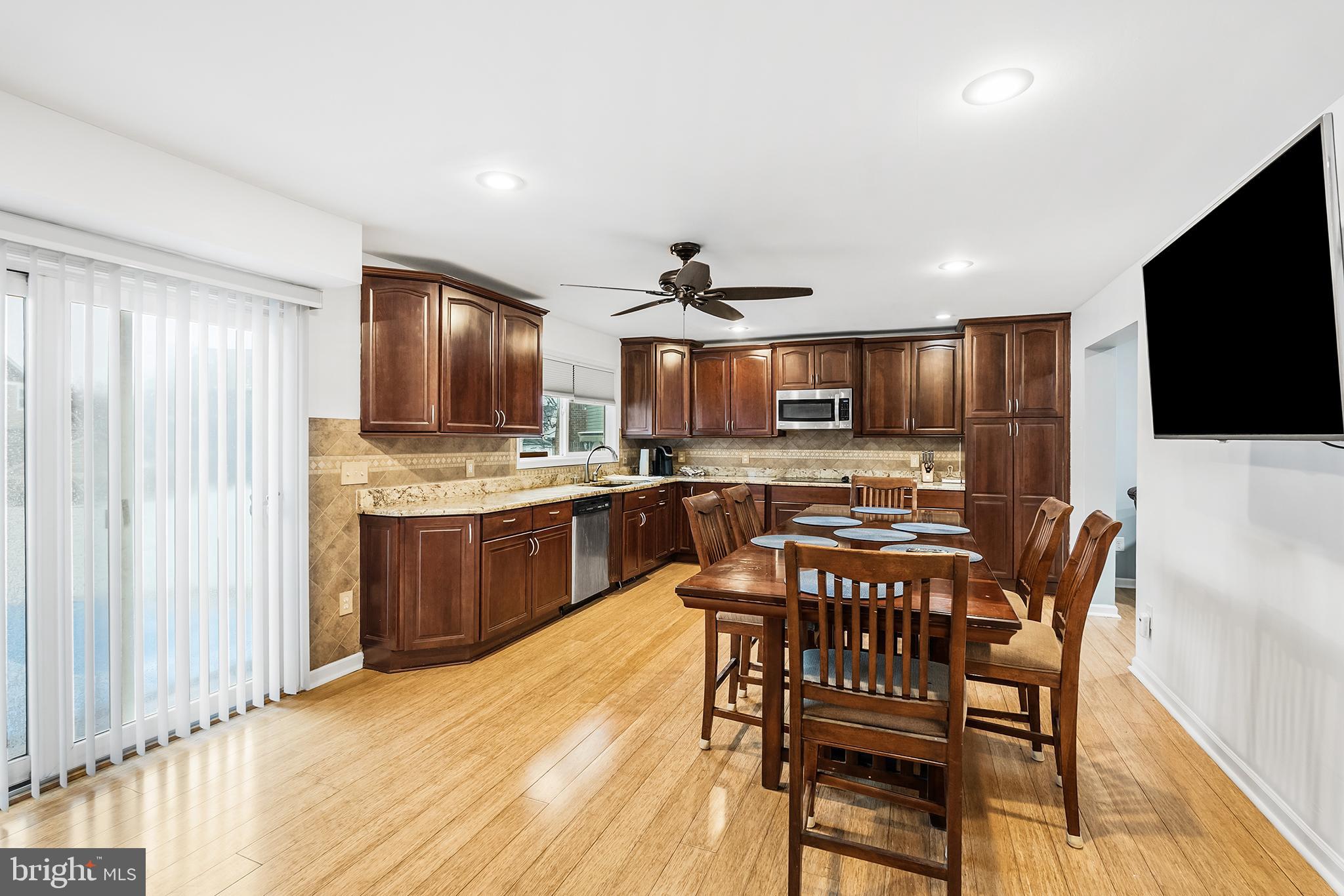 541 Stanford Road Fairless Hills, PA 19030 - Photo 7 of 30 Modern kitchen with warm wood accents.