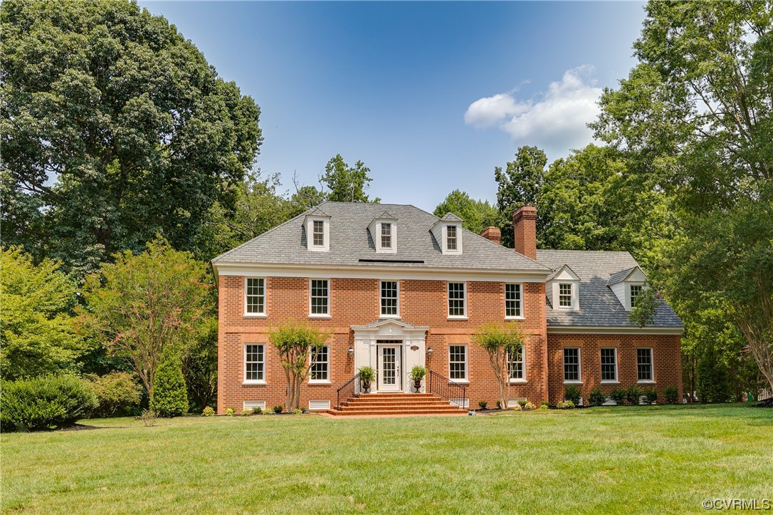 14221 West Salisbury Road Midlothian, VA 23113 - Photo 2 of 43 a front view of a house with garden