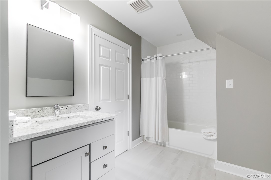14221 West Salisbury Road Midlothian, VA 23113 - Photo 23 of 43 a bathroom with a sink a mirror and a shower