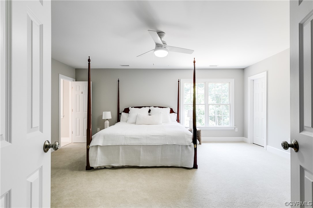 14221 West Salisbury Road Midlothian, VA 23113 - Photo 25 of 43 a bedroom with a bed and large window