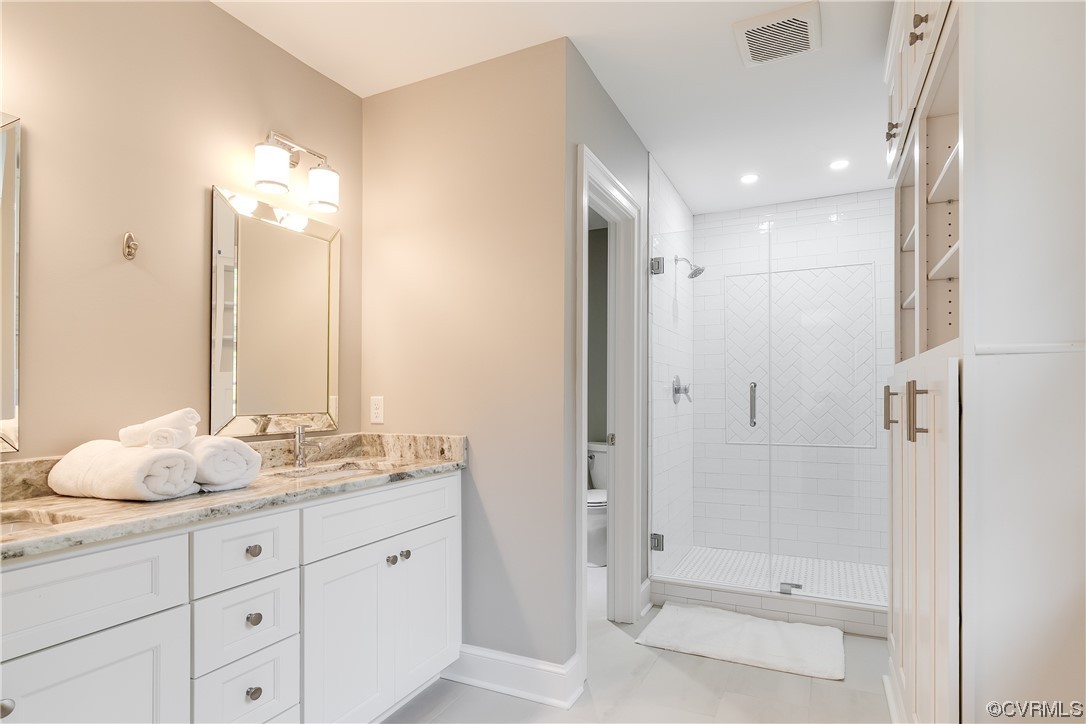 14221 West Salisbury Road Midlothian, VA 23113 - Photo 29 of 43 a bathroom with a granite countertop sink mirror and double