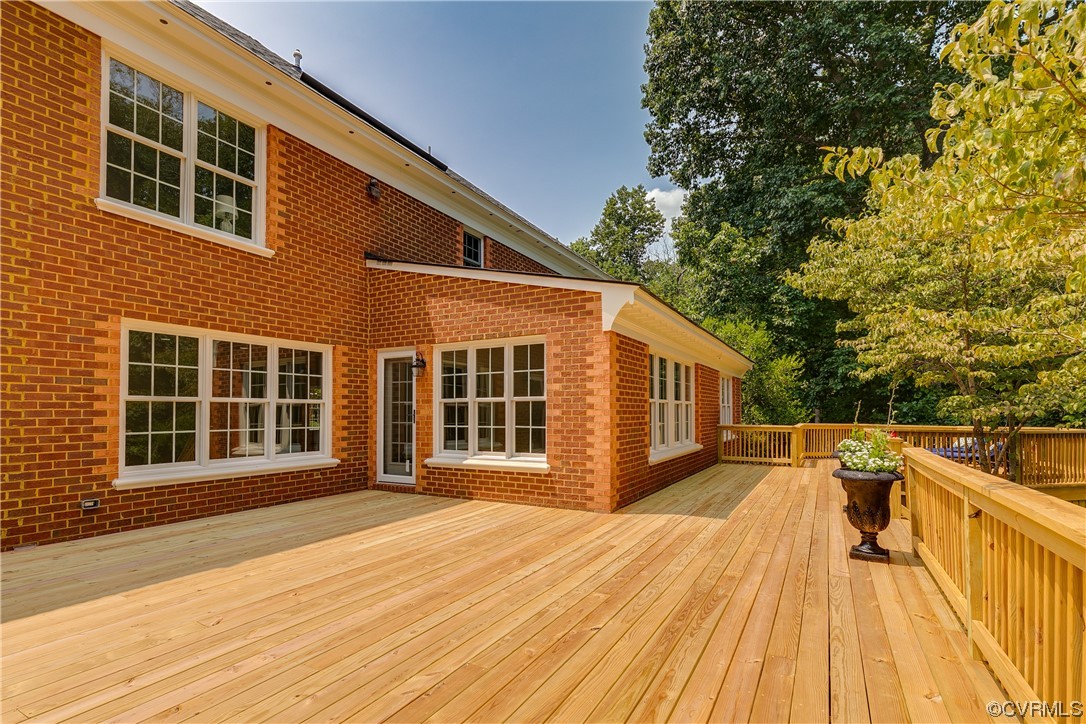 14221 West Salisbury Road Midlothian, VA 23113 - Photo 38 of 43 a view of a house with a roof deck