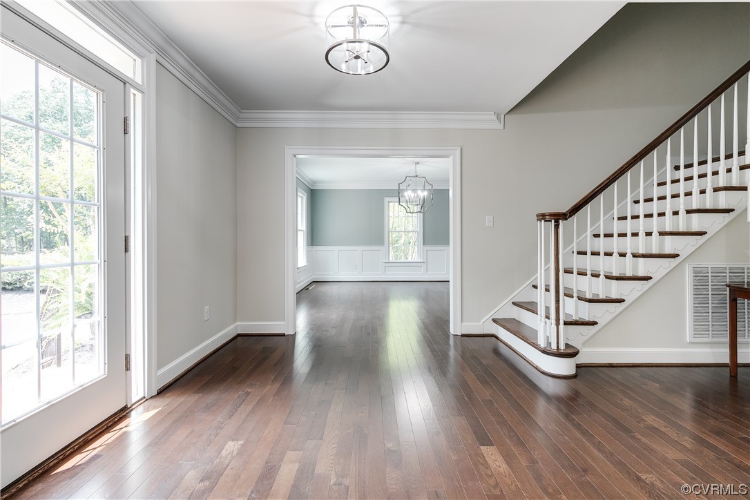 14221 West Salisbury Road Midlothian, VA 23113 - Photo 6 of 43 a view of entryway with wooden floor