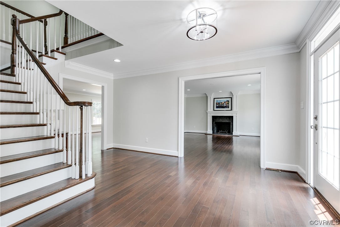14221 West Salisbury Road Midlothian, VA 23113 - Photo 7 of 43 a view of livingroom with hardwood floor and stairs