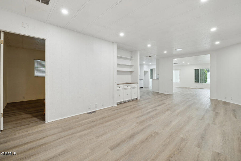 206 Browning Avenue, Unit 206 Ventura, CA 93003 - Photo 13 of 36 a view of empty room with wooden floor