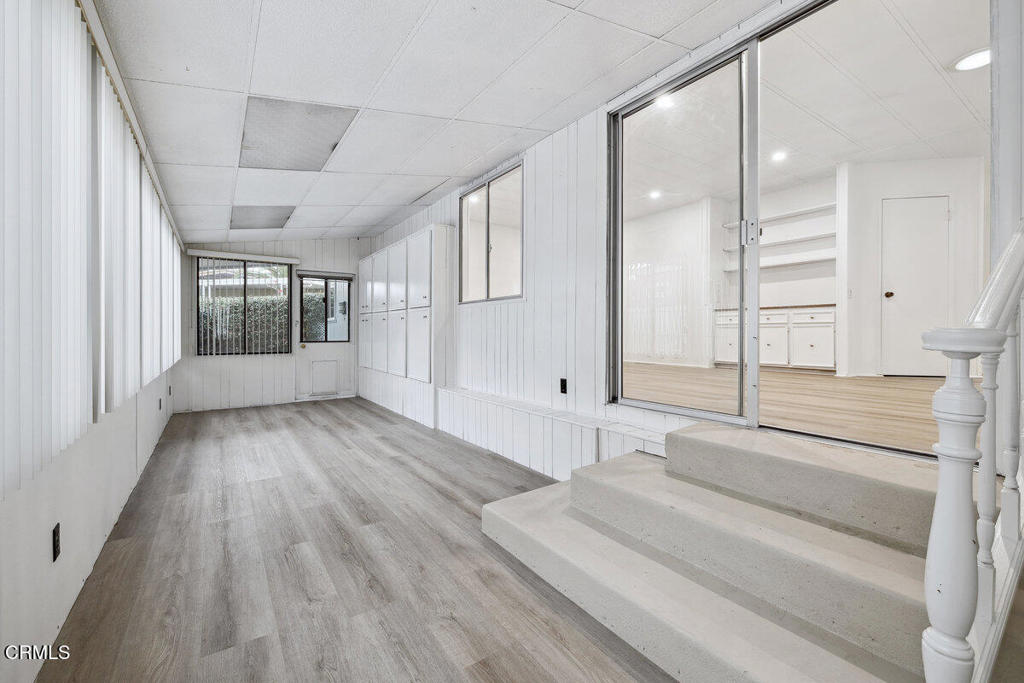 206 Browning Avenue, Unit 206 Ventura, CA 93003 - Photo 23 of 36 a bathroom with a sink and a large mirror