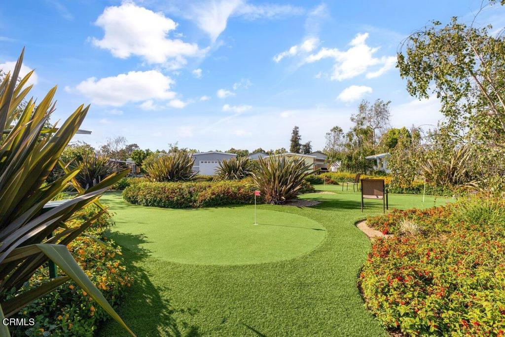 206 Browning Avenue, Unit 206 Ventura, CA 93003 - Photo 27 of 36 a view of a golf course with a lake