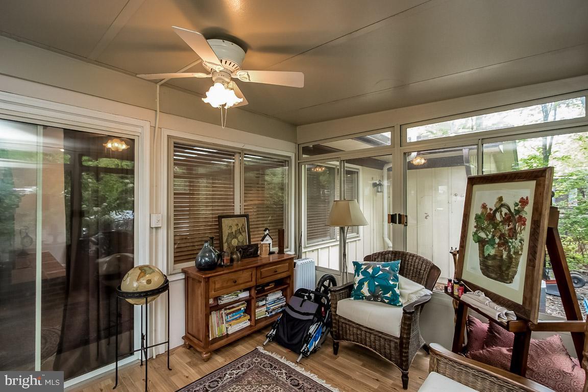 11241 South Shore Road Reston, VA 20190 - Photo 17 of 34 Sun Room has Ceiling Fan and door to back of home!
