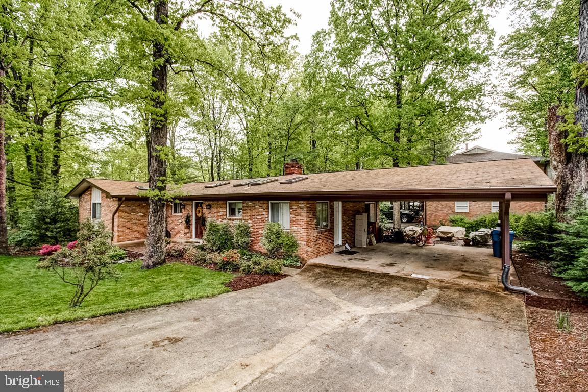 11241 South Shore Road Reston, VA 20190 - Photo 30 of 34 Wooded Lot shades the entire lot & 2 car carport!