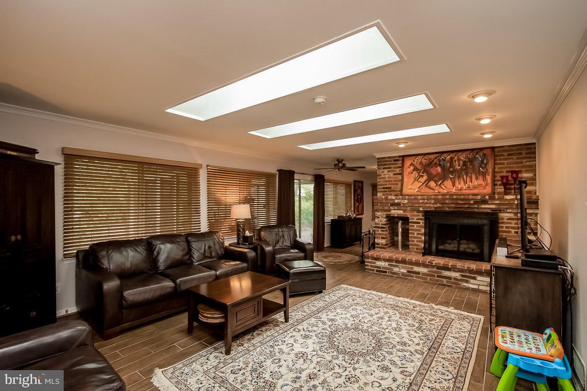 11241 South Shore Road Reston, VA 20190 - Photo 4 of 34 Floor to ceiling FIREPLACE with gas insert!
