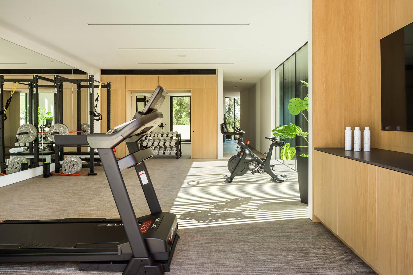 455 Pinehill Road Hillsborough, CA 94010 - Photo 21 of 33 a view of a room with gym equipment